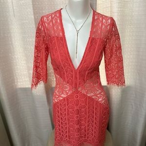 Beautiful knee and elbow length Coral dress in mint condition